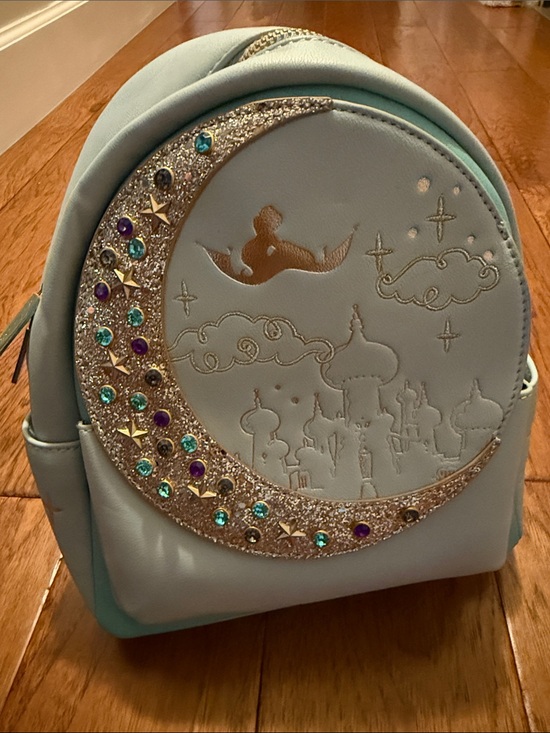 Danielle Nicole Handbags - Danielle Nicole Light Blue Moon & Gem Embellished Mini Backpack